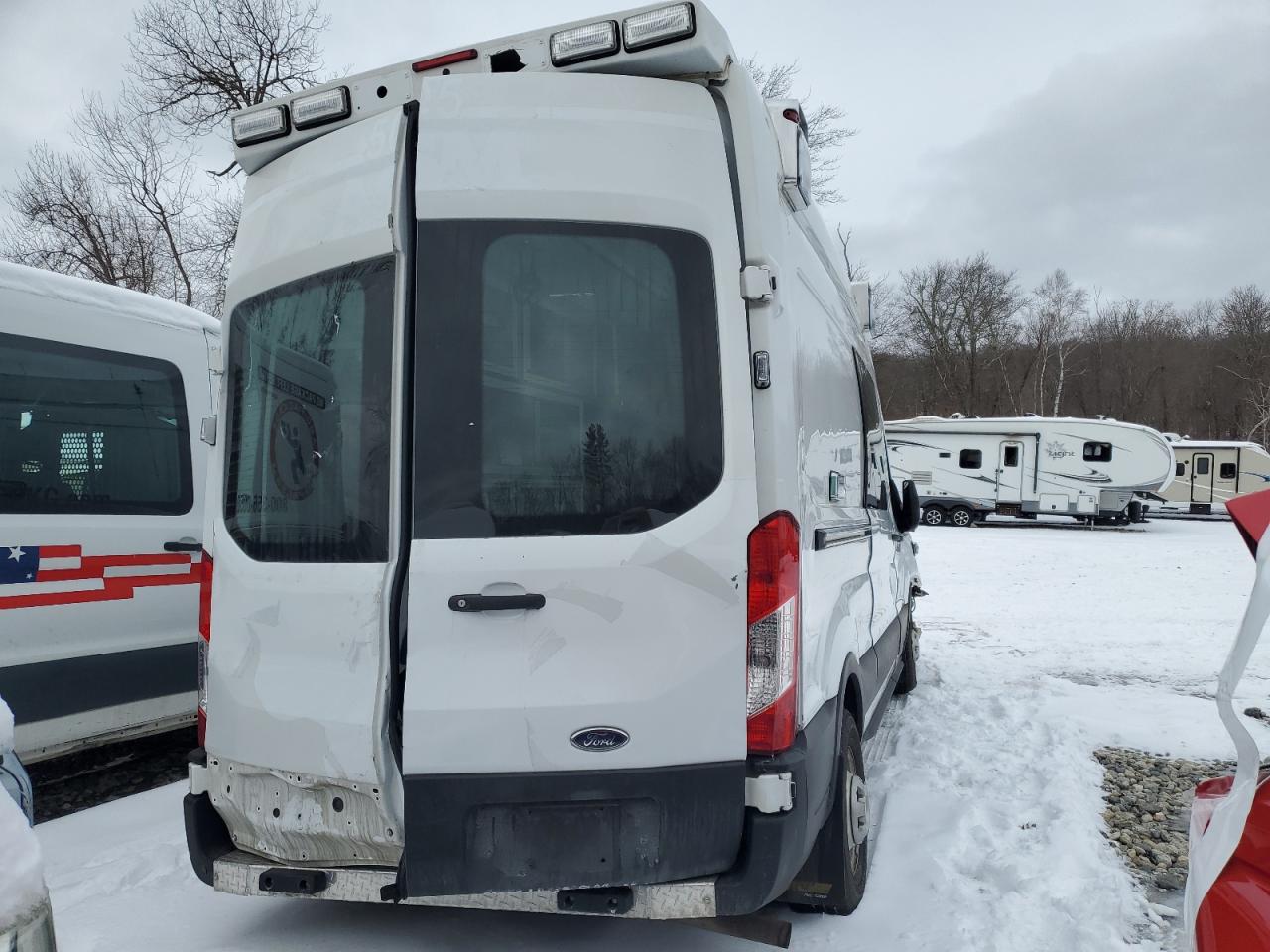 2023 Ford Transit VIN 1FDBW2XG4PKA51968 Copart auction photo, rollover damage thumbnail 3
