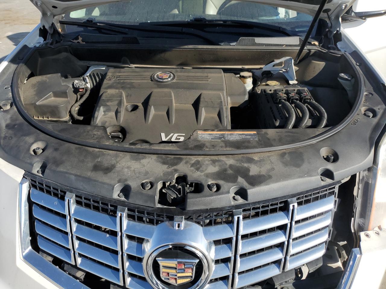 2014 Cadillac SRX VIN 3GYFNBE30ES519702 Copart auction photo, front end / side damage thumbnail 13