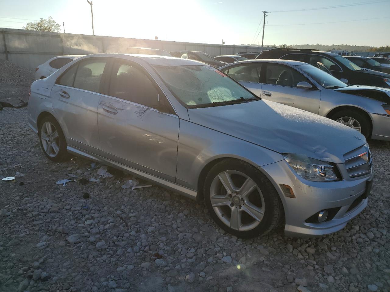 2009 Mercedes-Benz C-klasse VIN WDDGF54XX9R069648 Copart auction photo, side / front end damage thumbnail 4