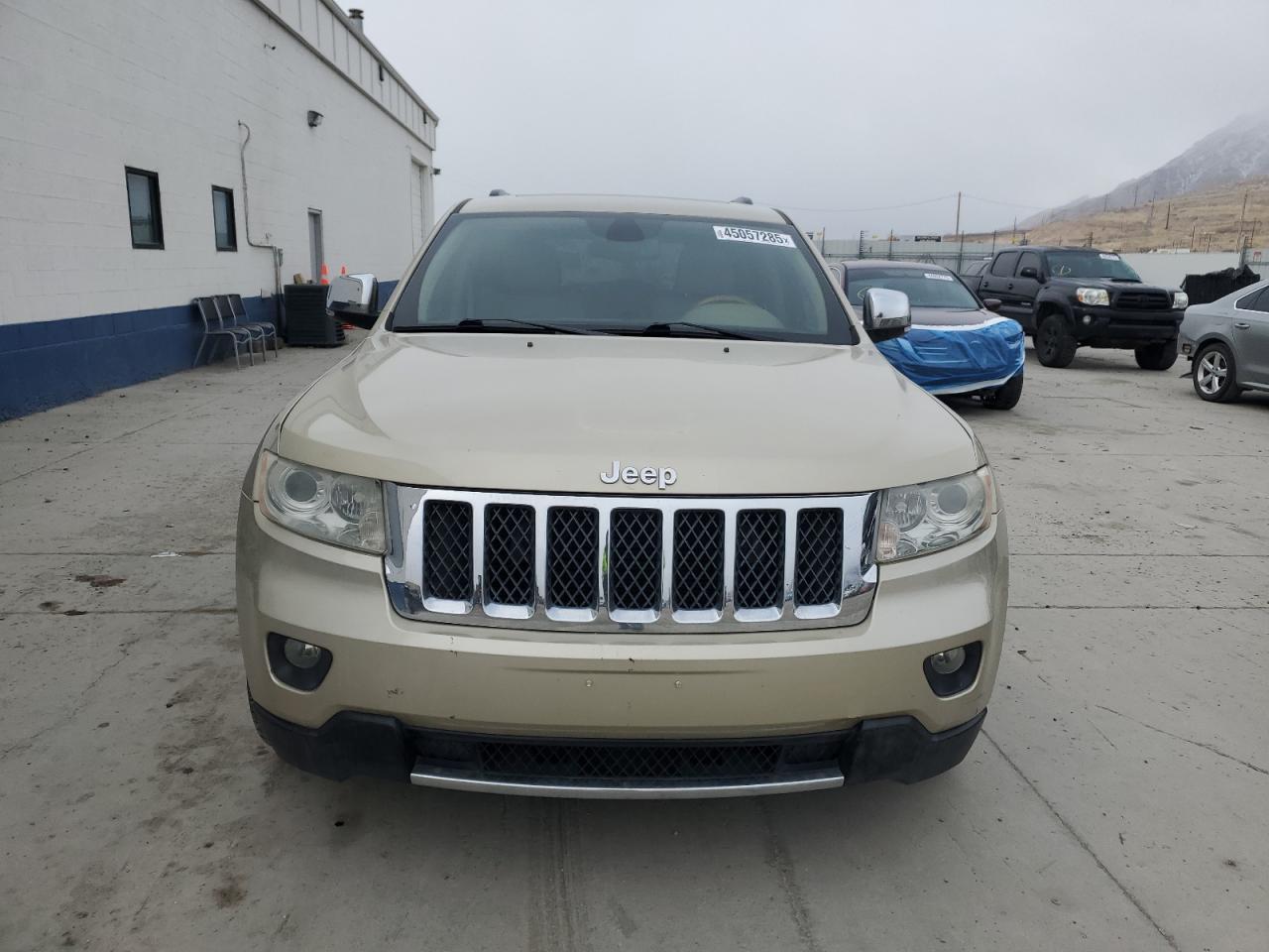 2012 Jeep Grand Cherokee VIN 1C4RJFCT0CC135852 Copart auction photo, minor dent/scratches damage thumbnail 5