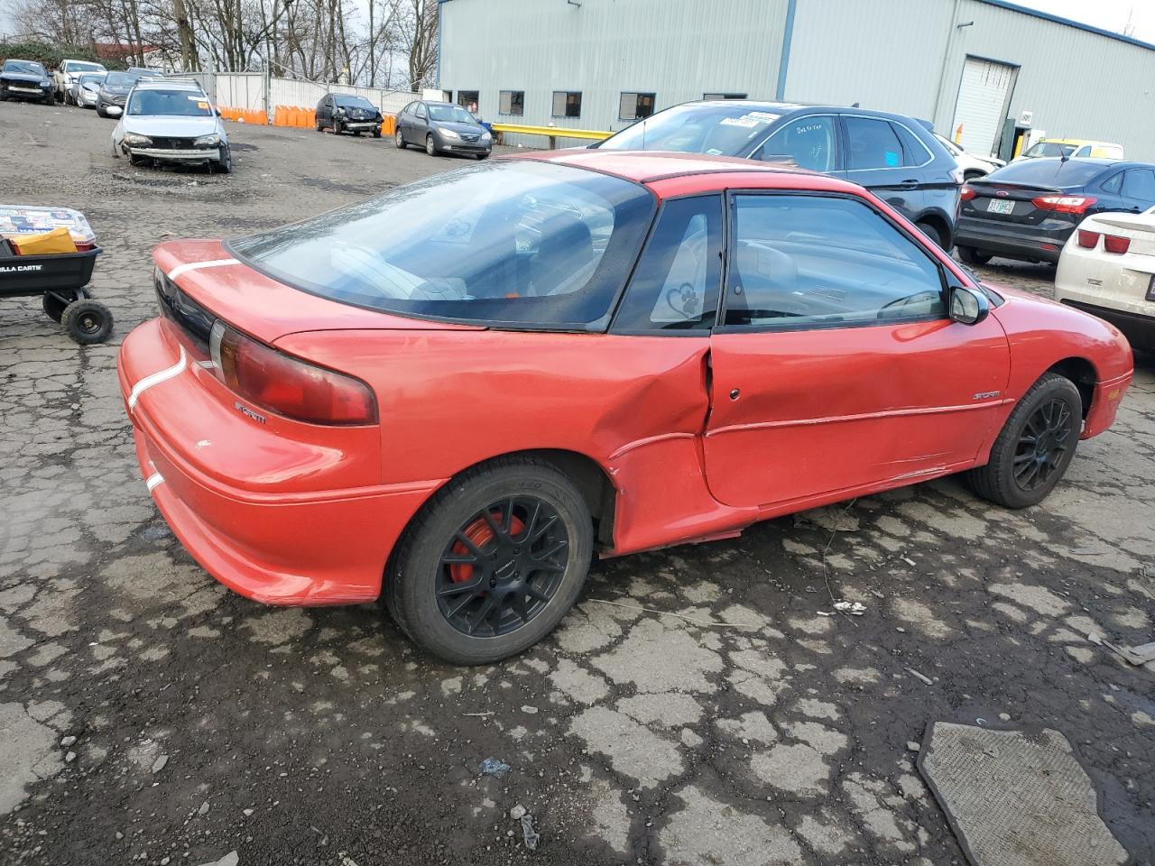 1992 GEO Storm VIN J81RF236XN7557493 Copart auction photo, side damage thumbnail 3