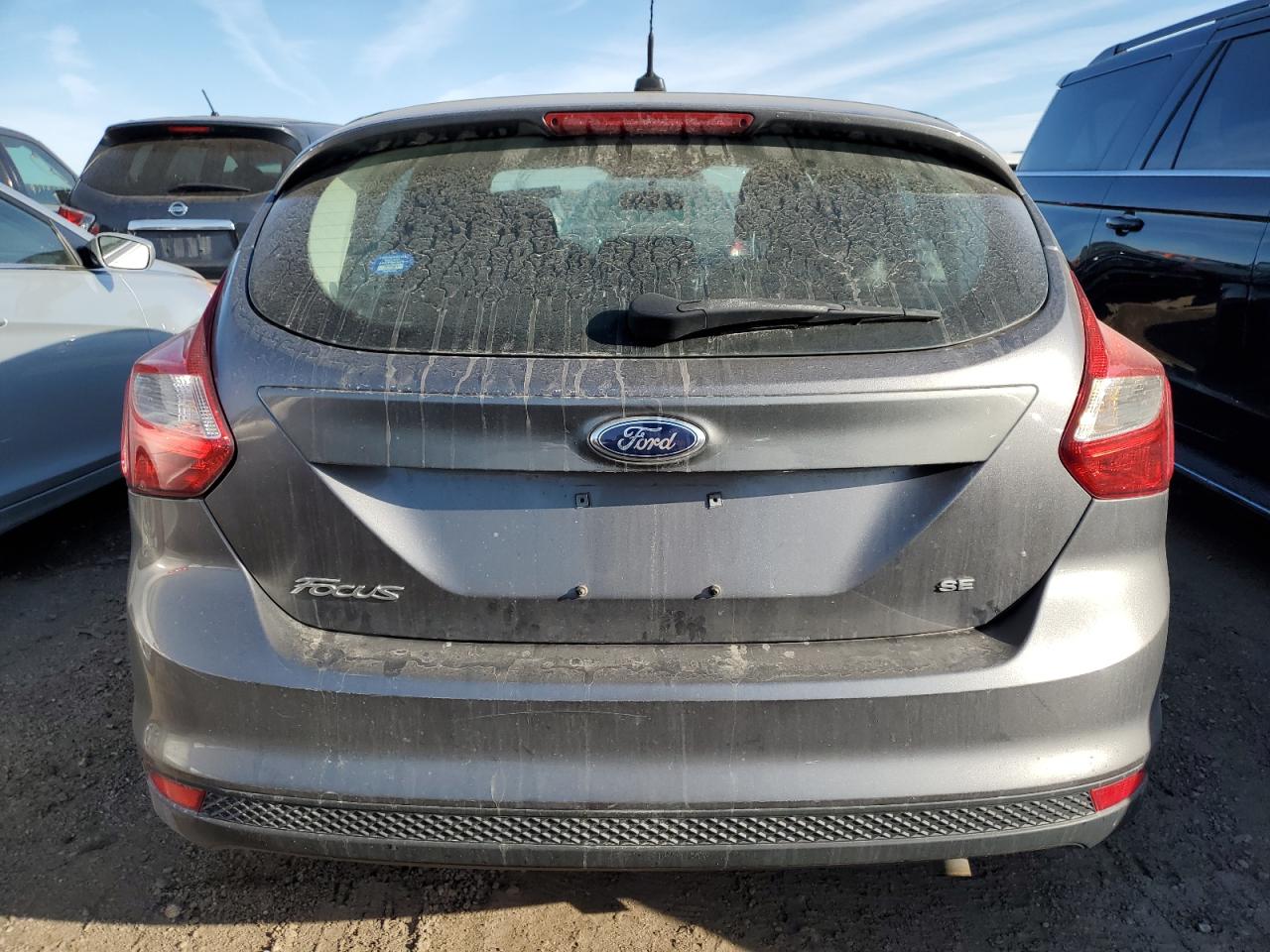 2014 Ford Focus VIN 1FADP3K22EL164861 Copart auction photo, front end / minor dent/scratches damage thumbnail 6