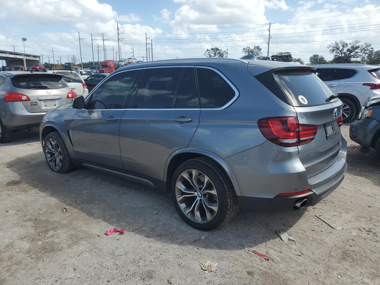 2014 BMW X5 VIN 5UXKR0C55E0H19999 Copart auction photo, undercarriage / minor dent/scratches damage thumbnail 2