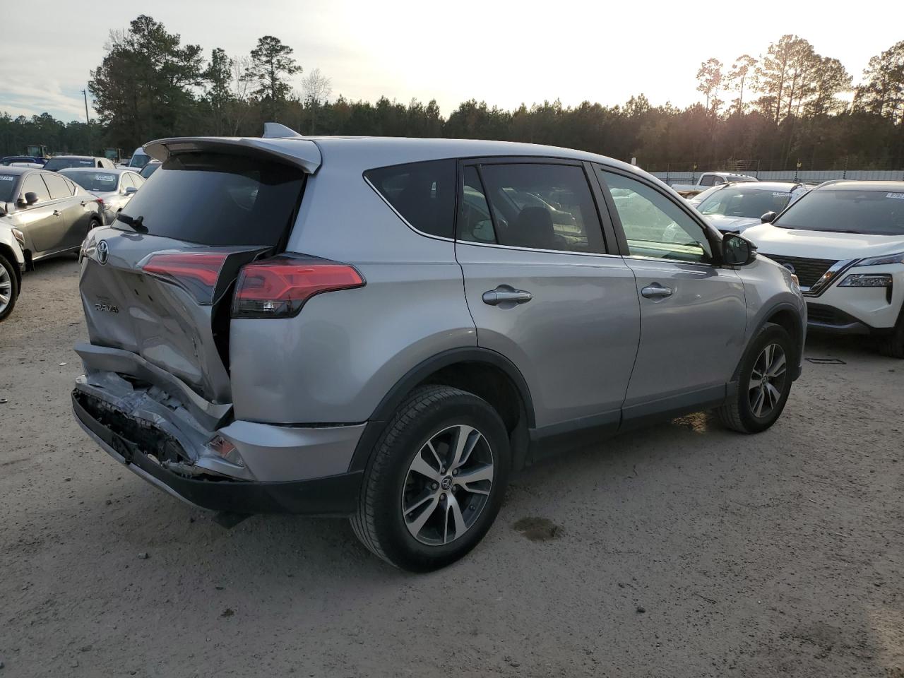 2018 Toyota RAV 4 VIN 2T3RFREV1JW701772 Copart auction photo, all over damage thumbnail 3