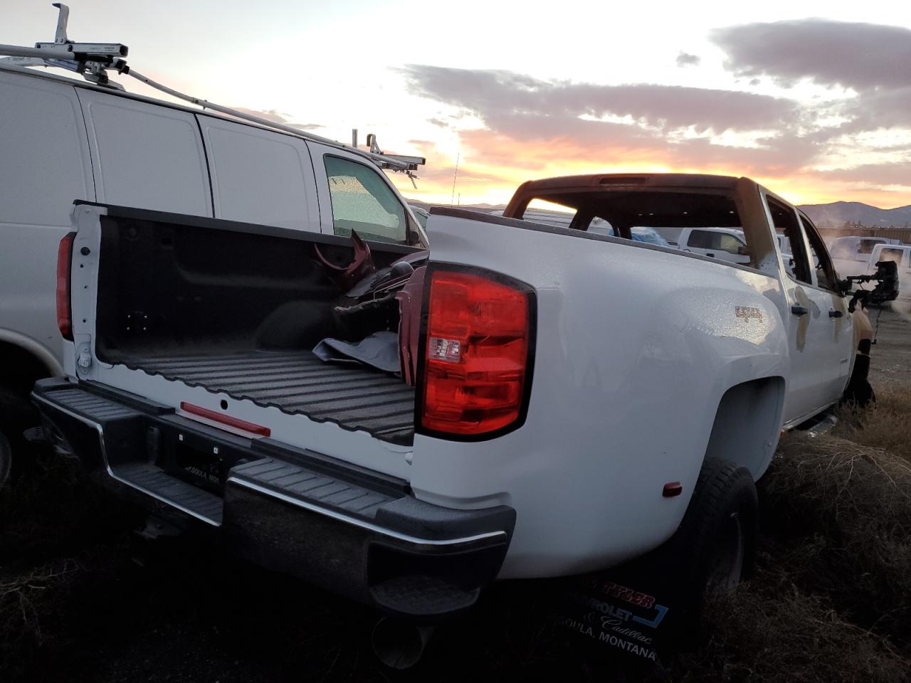 2017 Chevrolet Silverado VIN 1GC4KYCY4HF172519 Copart auction photo, burn damage thumbnail 4