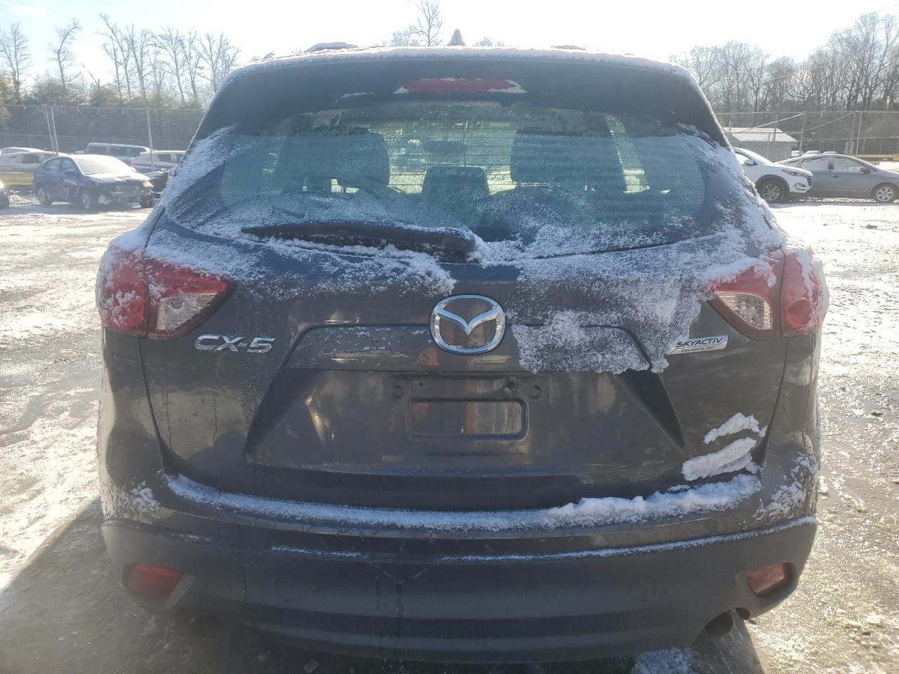 2015 Mazda CX-5 VIN JM3KE2BE9F0544978 Copart auction photo, side / minor dent/scratches damage thumbnail 6