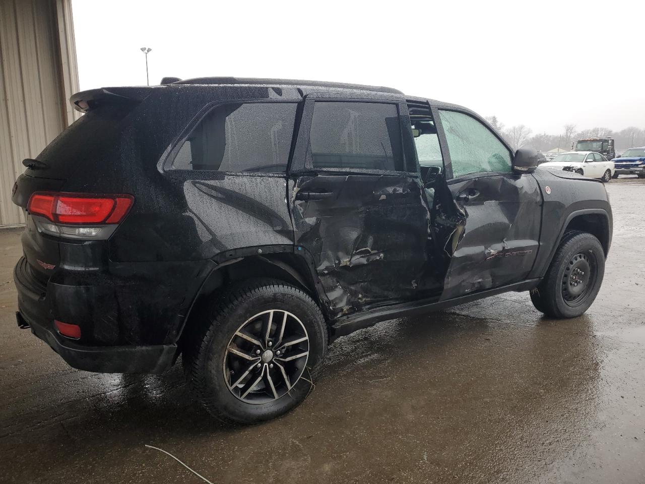 2017 Jeep Grand Cherokee VIN 1C4RJFLG0HC671274 Copart auction photo, side / rear end damage thumbnail 3