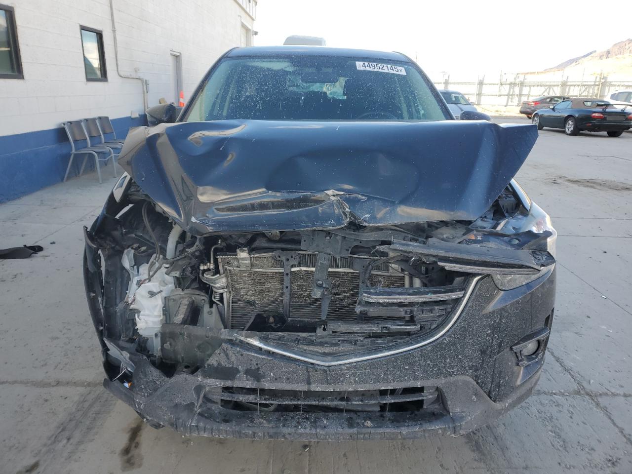 2016 Mazda CX-5 VIN JM3KE4CY7G0879078 Copart auction photo, front end / rear end damage thumbnail 5