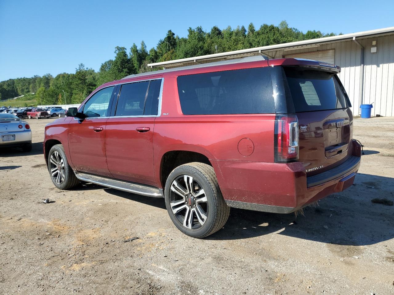 2019 GMC Yukon VIN 1GKS2GKC0KR183311 Copart auction photo, rear end / side damage thumbnail 2