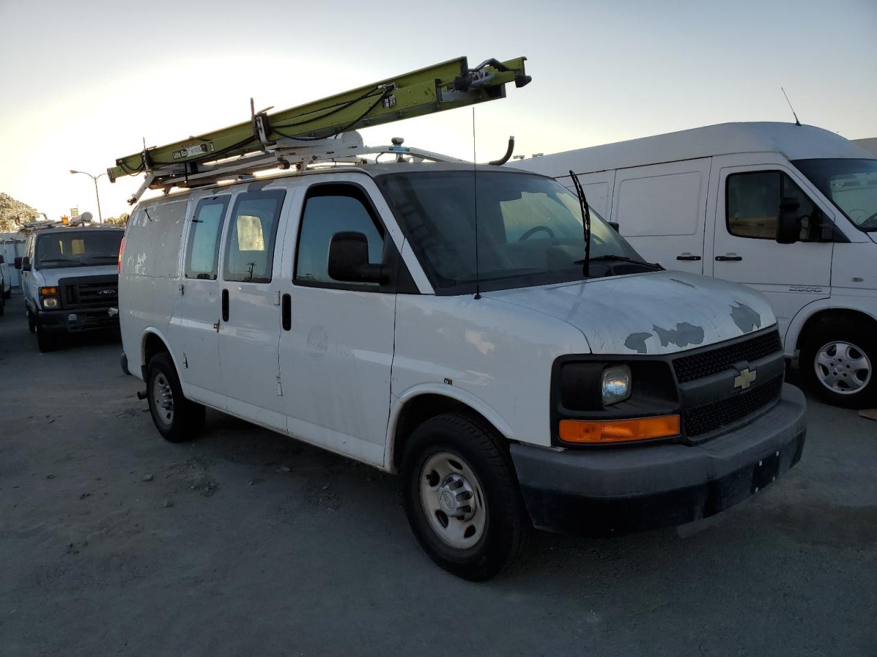 2012 Chevrolet Express VIN 1GCWGFCG1C1196207 Copart auction photo, minor dent/scratches damage thumbnail 4