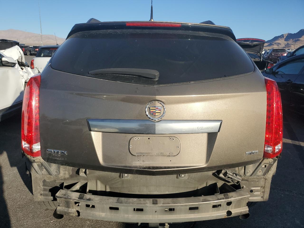 2014 Cadillac SRX VIN 3GYFNAE34ES561414 Copart auction photo, undercarriage damage thumbnail 6