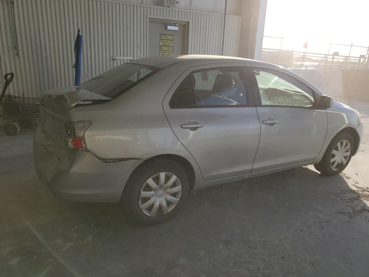 2010 Toyota Yaris VIN JTDBT4K32A1365810 Copart auction photo, rear end damage thumbnail 3