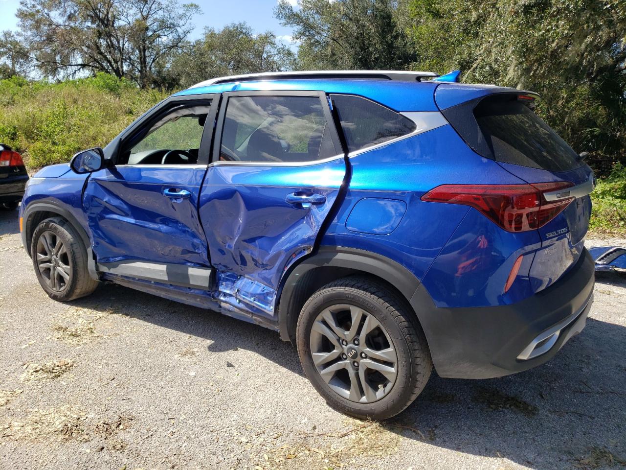 2021 KIA Seltos VIN KNDEU2AA4M7046358 Copart auction photo, side damage thumbnail 2