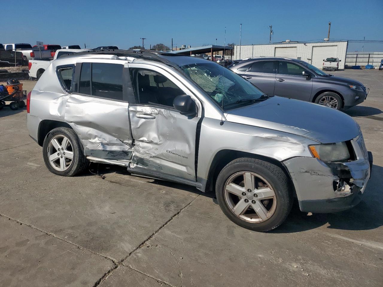 2011 Jeep Compass VIN 1J4NF5FB3BD257539 Copart auction photo, side / front end damage thumbnail 4