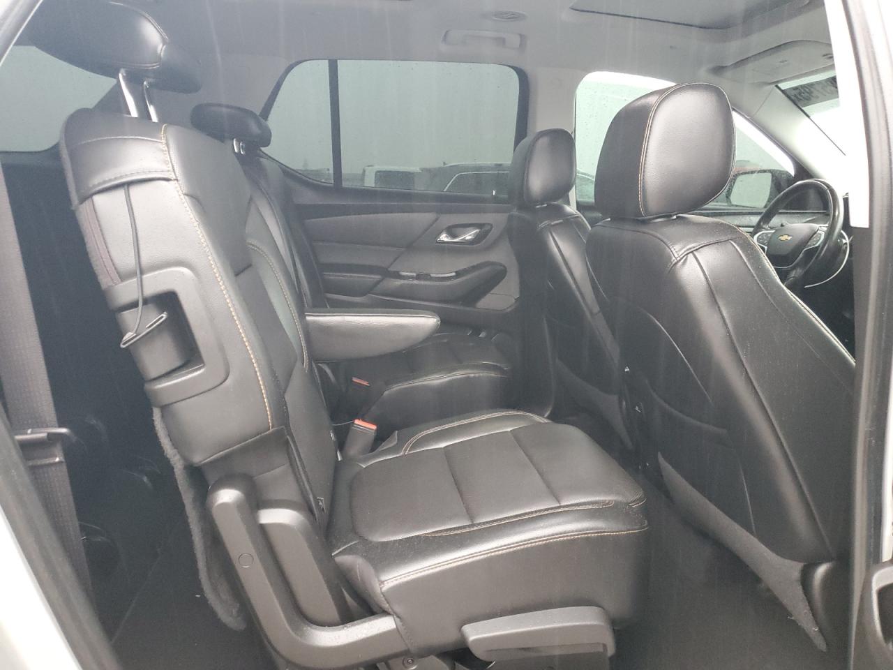 2018 Chevrolet Traverse VIN 1GNERKKW2JJ214774 Copart auction photo, rear end / hail damage thumbnail 11