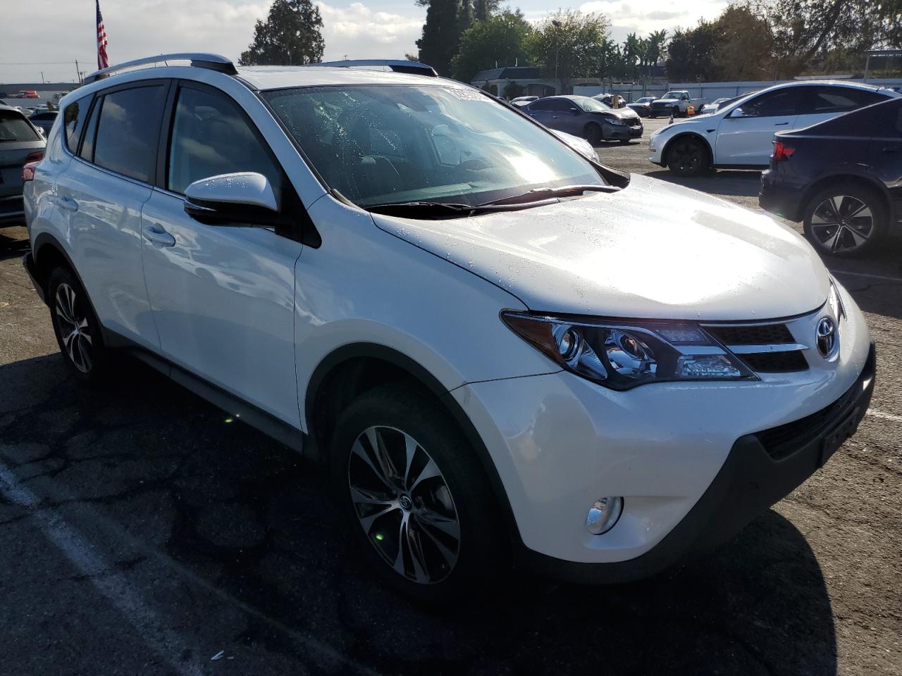 2015 Toyota RAV 4 VIN 2T3YFREV7FW189082 Copart auction photo, rear end / minor dent/scratches damage thumbnail 4