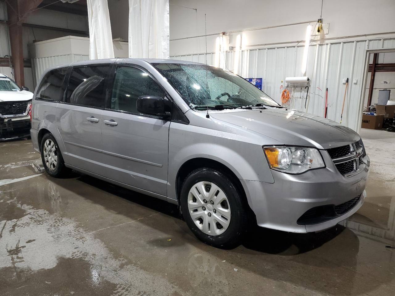 2014 Dodge Caravan VIN 2C4RDGBG0ER141128 Copart auction photo, side / rear end damage thumbnail 4