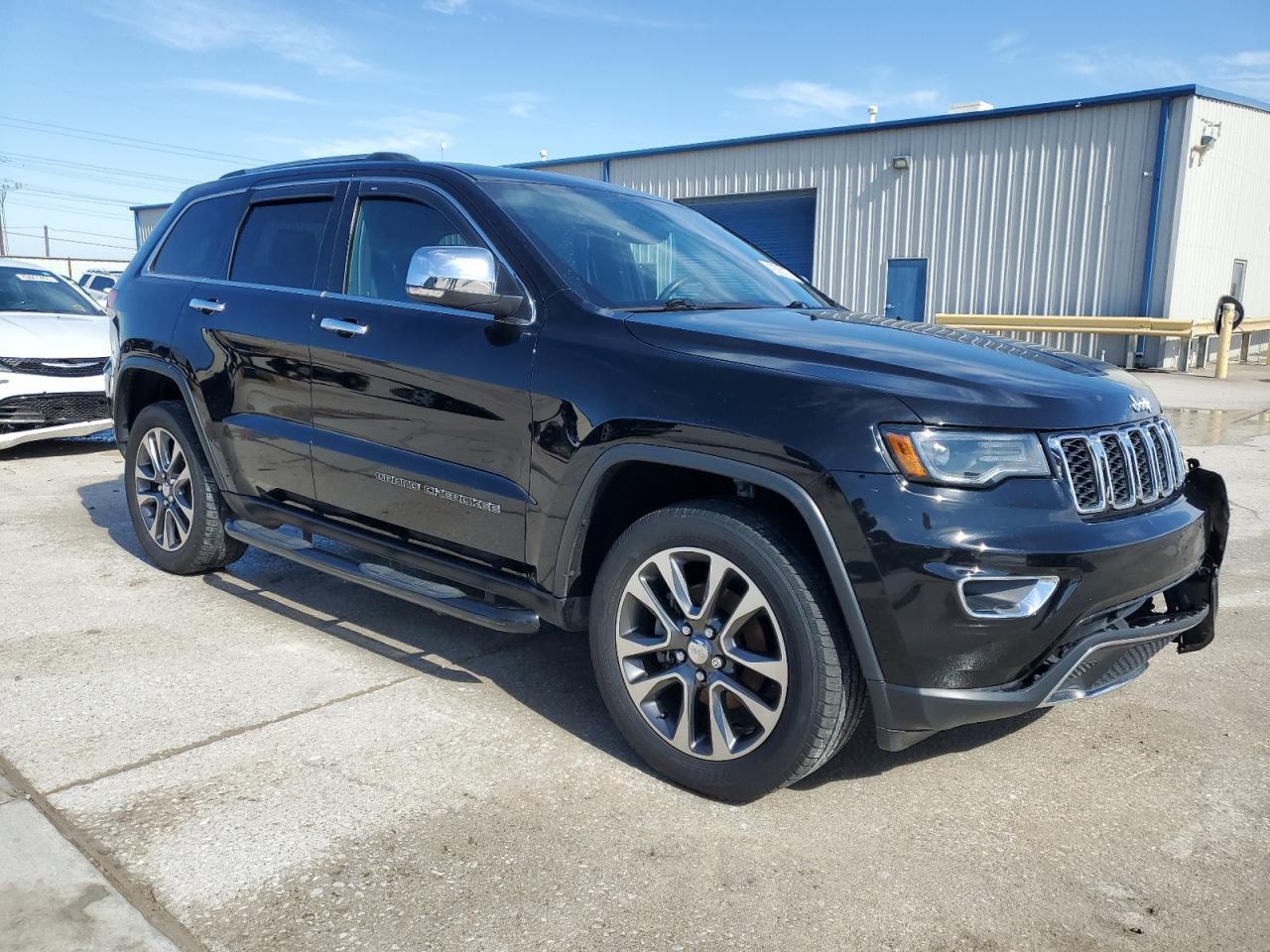 2018 Jeep Grand Cherokee VIN 1C4RJFBGXJC245387 Copart auction photo, front end damage thumbnail 4