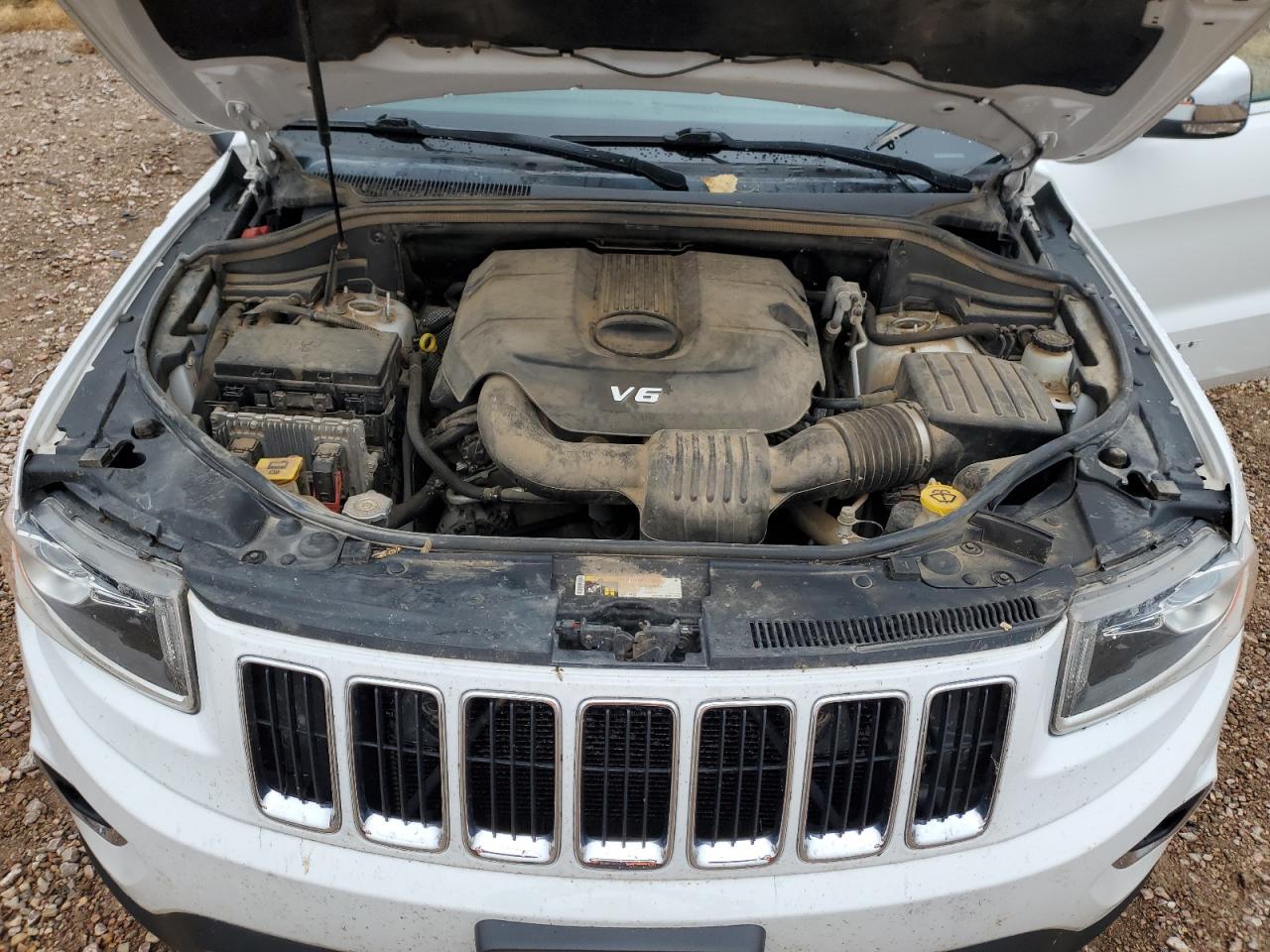 2015 Jeep Grand Cherokee VIN 1C4RJFBG8FC158773 Copart auction photo, side / front end damage thumbnail 12