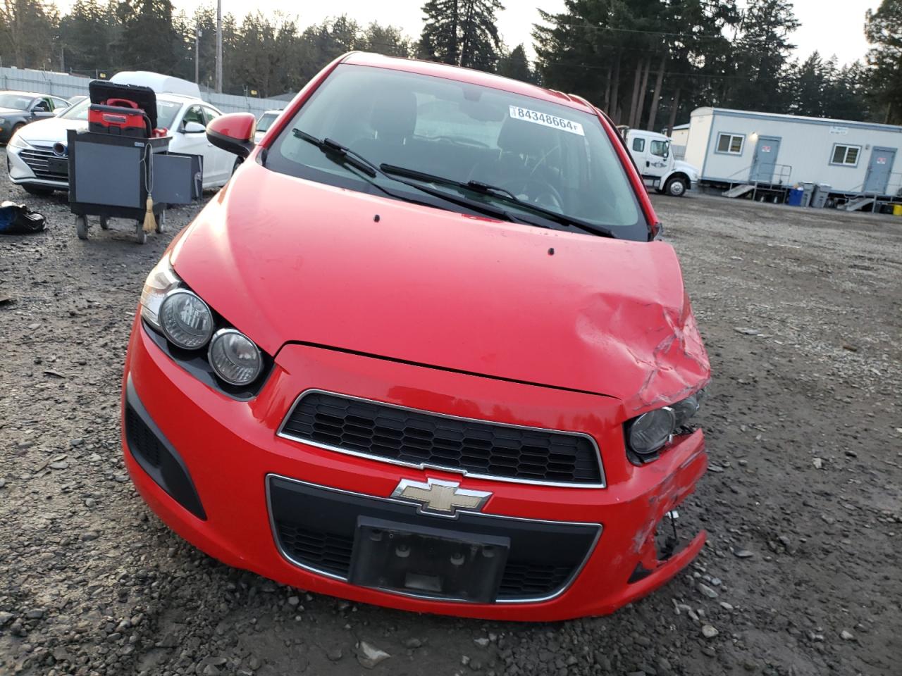 2015 Chevrolet Sonic VIN 1G1JC6SB4F4140480 Copart auction photo, all over damage thumbnail 5