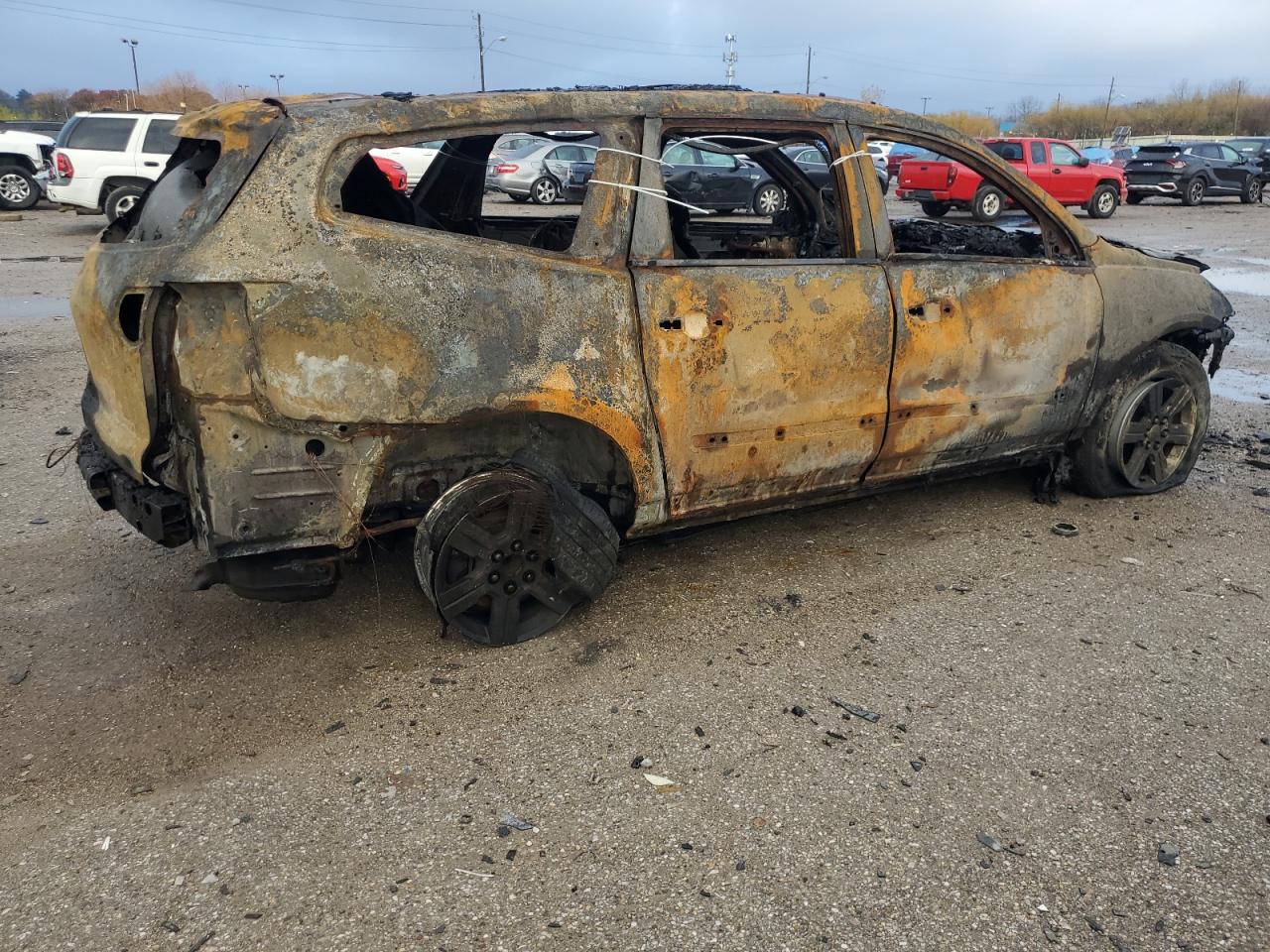 2011 Chevrolet Traverse VIN 1GNKRGED5BJ334273 Copart auction photo, burn damage thumbnail 3