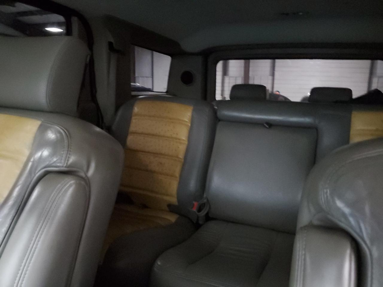 2003 Hummer H2 VIN 5GRGN23U73H127407 Copart auction photo, side / rear end damage thumbnail 10