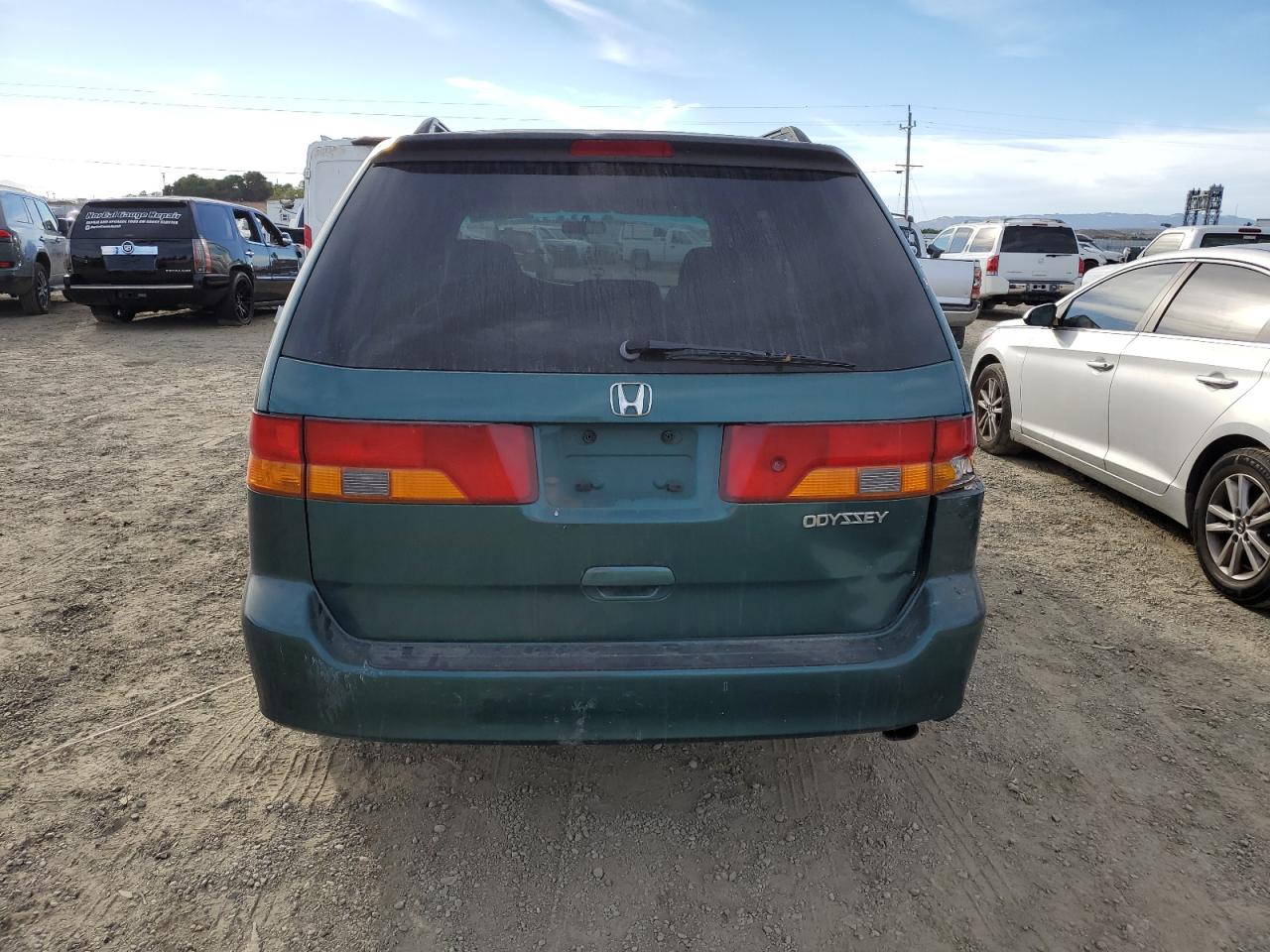 2002 Honda Odyssey VIN 2HKRL18682H506355 Copart auction photo, rear end damage thumbnail 6