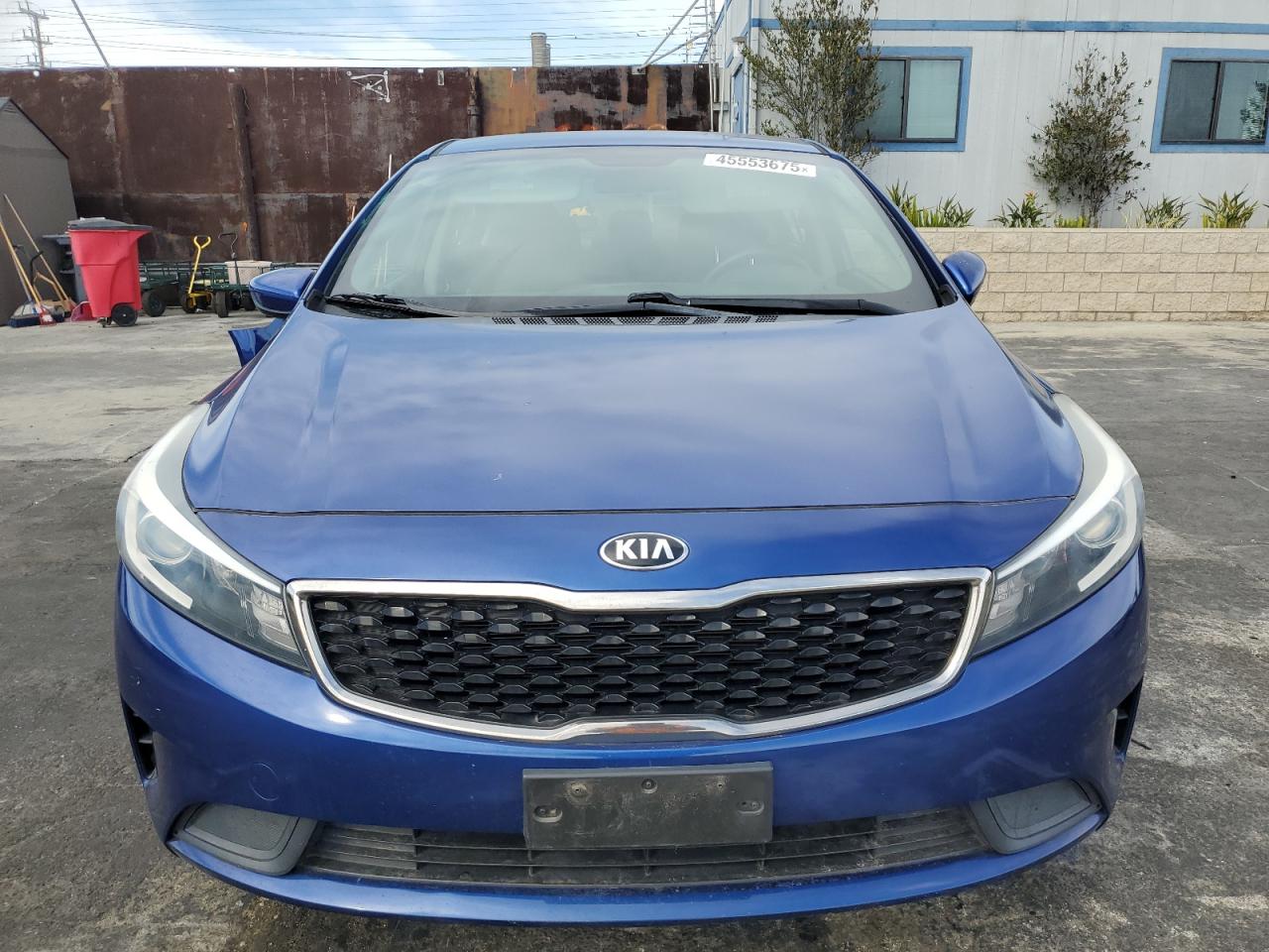 2017 KIA Forte VIN 3KPFK4A7XHE040810 Copart auction photo, rear end damage thumbnail 5