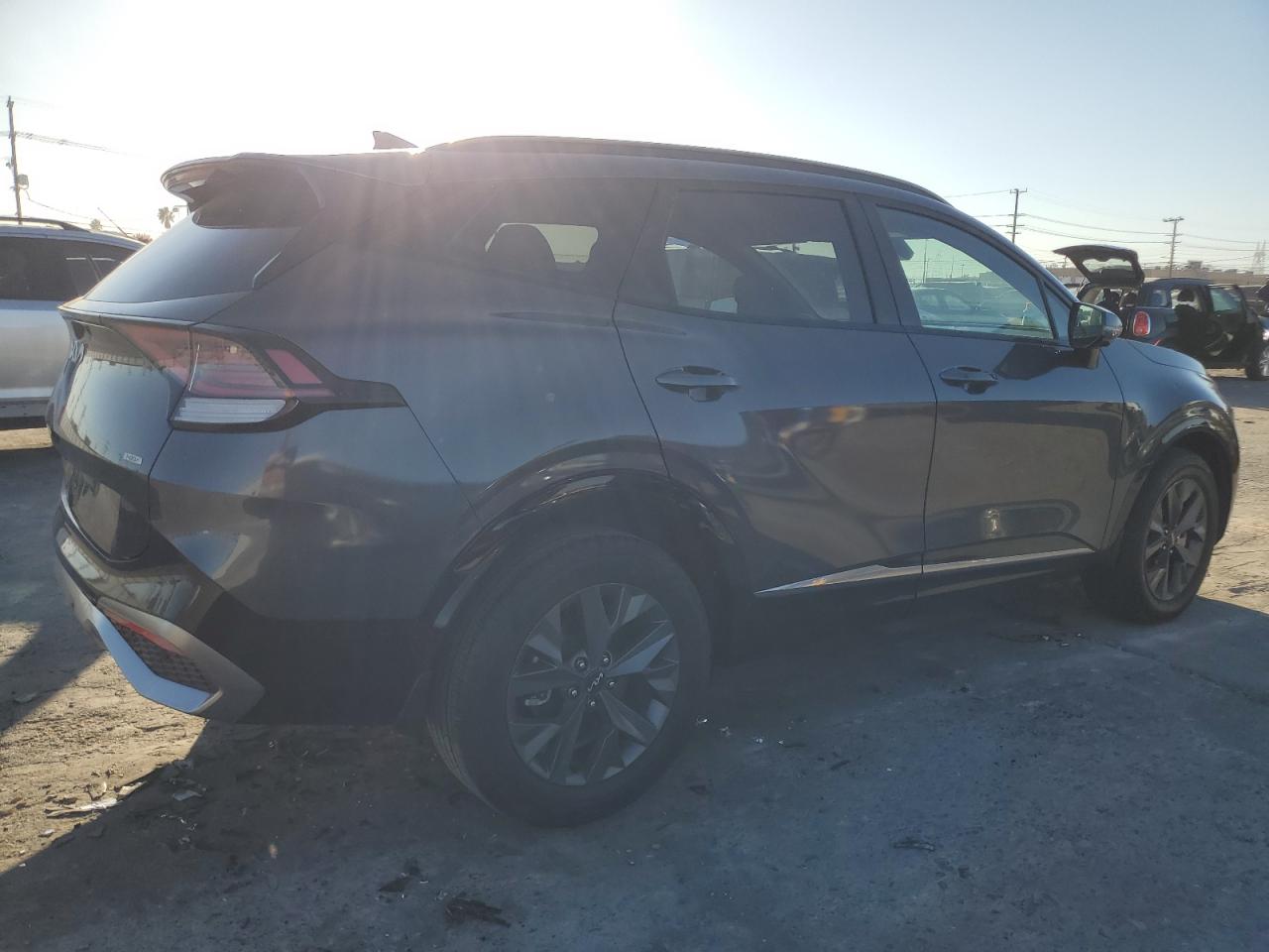 2023 KIA Sportage VIN KNDPXCAGXP7011421 Copart auction photo, side / front end damage thumbnail 3
