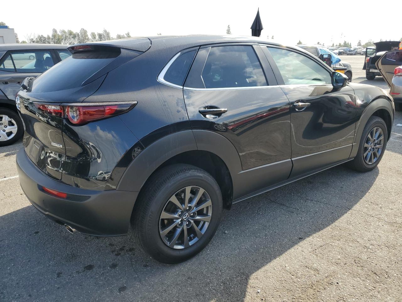 2023 Mazda CX-30 VIN 3MVDMBAM0PM520496 Copart auction photo, side damage thumbnail 3
