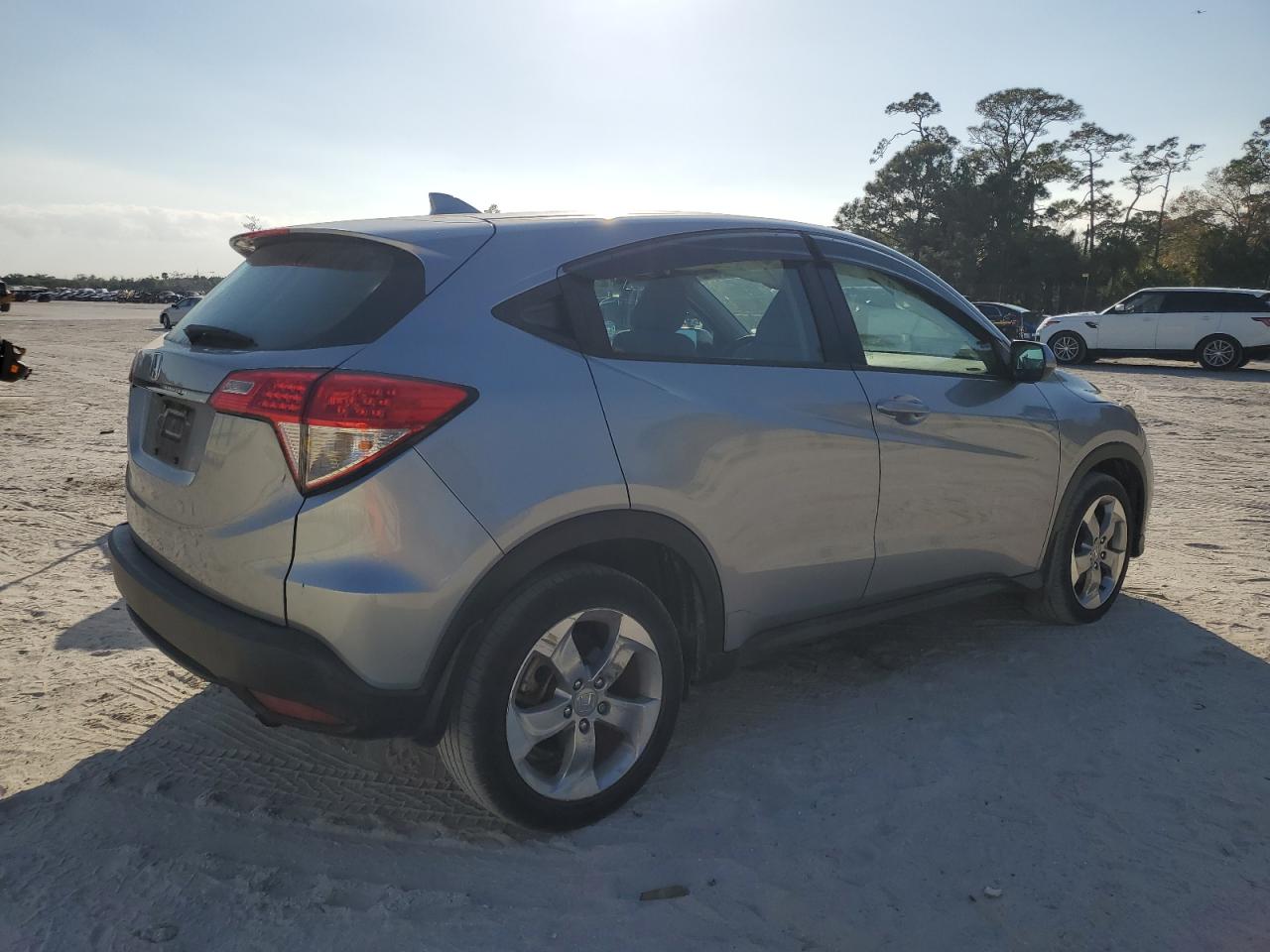 2019 Honda HR-V VIN 3CZRU5H38KG712322 Copart auction photo, undercarriage / minor dent/scratches damage thumbnail 3