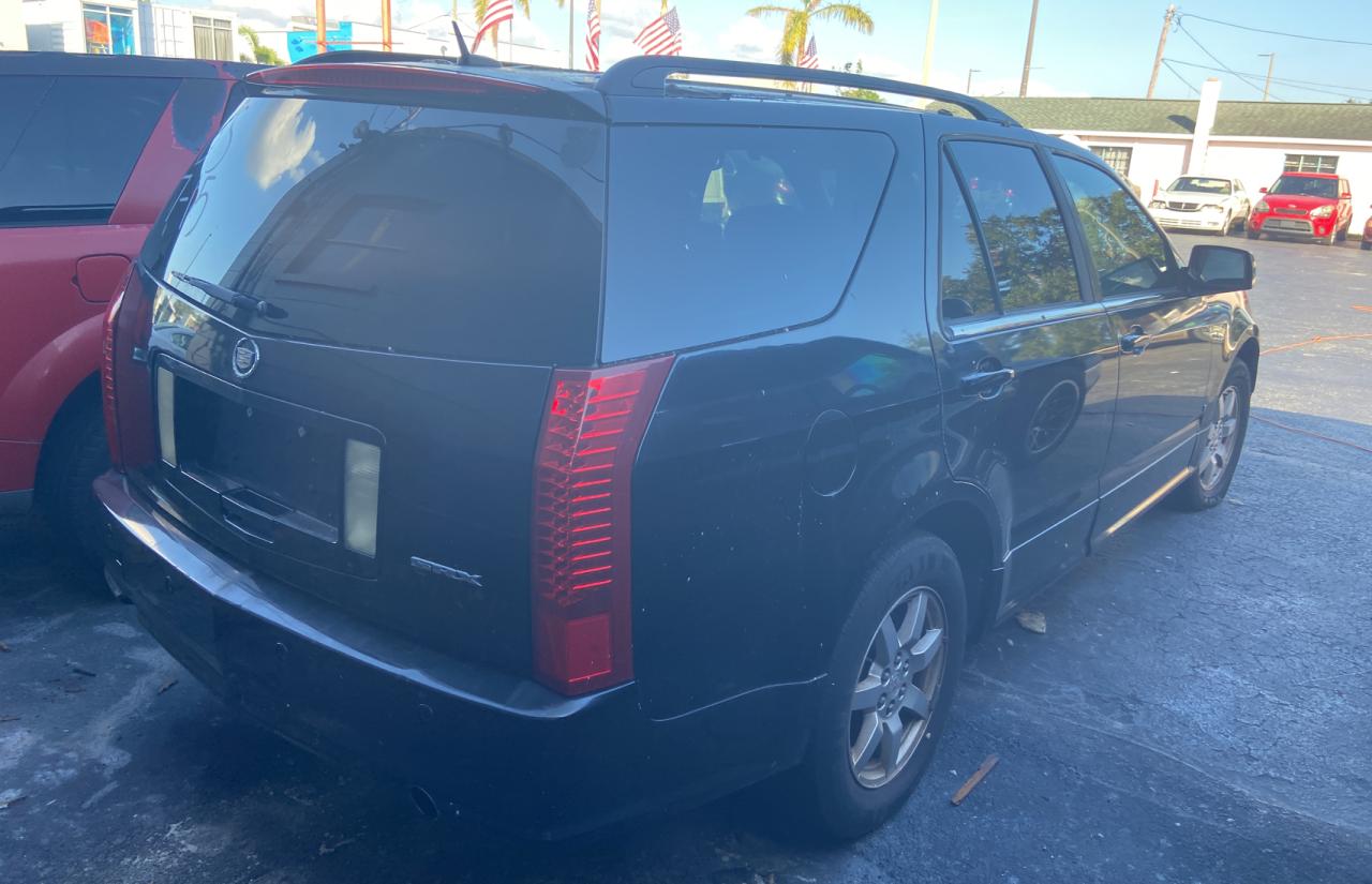 2009 Cadillac SRX VIN 1GYEE637890103077 Copart auction photo, minor dent/scratches / partial repair damage thumbnail 4