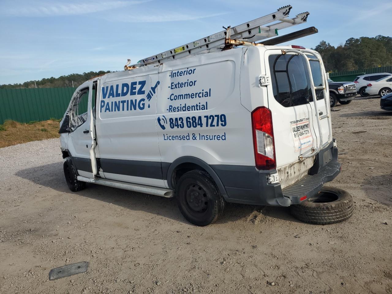 2015 Ford Transit VIN 1FTNR1ZM5FKB20770 Copart auction photo, all over damage thumbnail 2