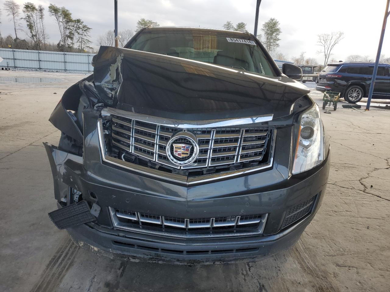 2015 Cadillac SRX VIN 3GYFNBE31FS615968 Copart auction photo, all over damage thumbnail 5