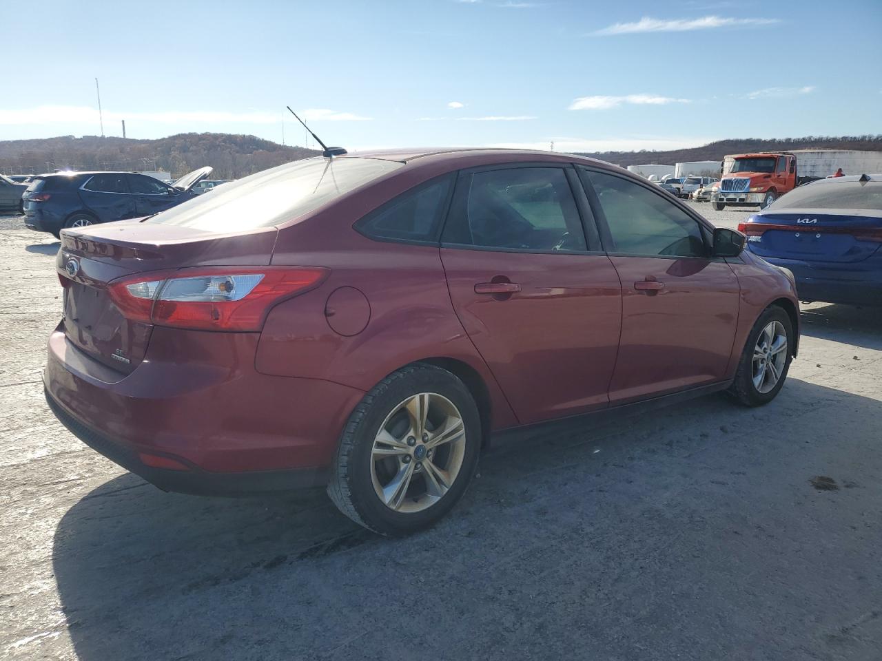 2014 Ford Focus VIN 1FADP3F23EL130633 Copart auction photo, rear end / minor dent/scratches damage thumbnail 3