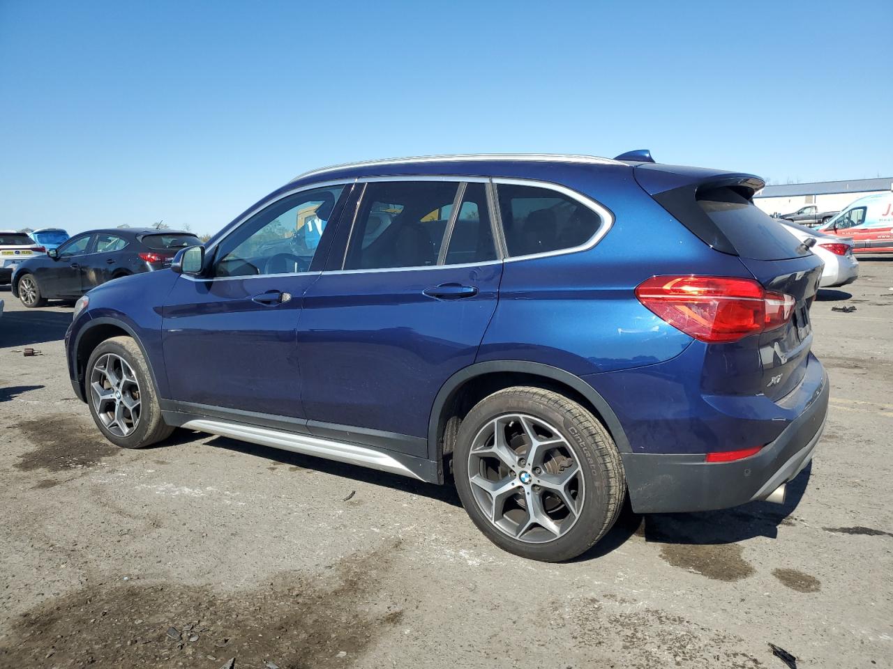 2019 BMW X1 VIN WBXHT3C58K5L37057 Copart auction photo, side / front end damage thumbnail 2