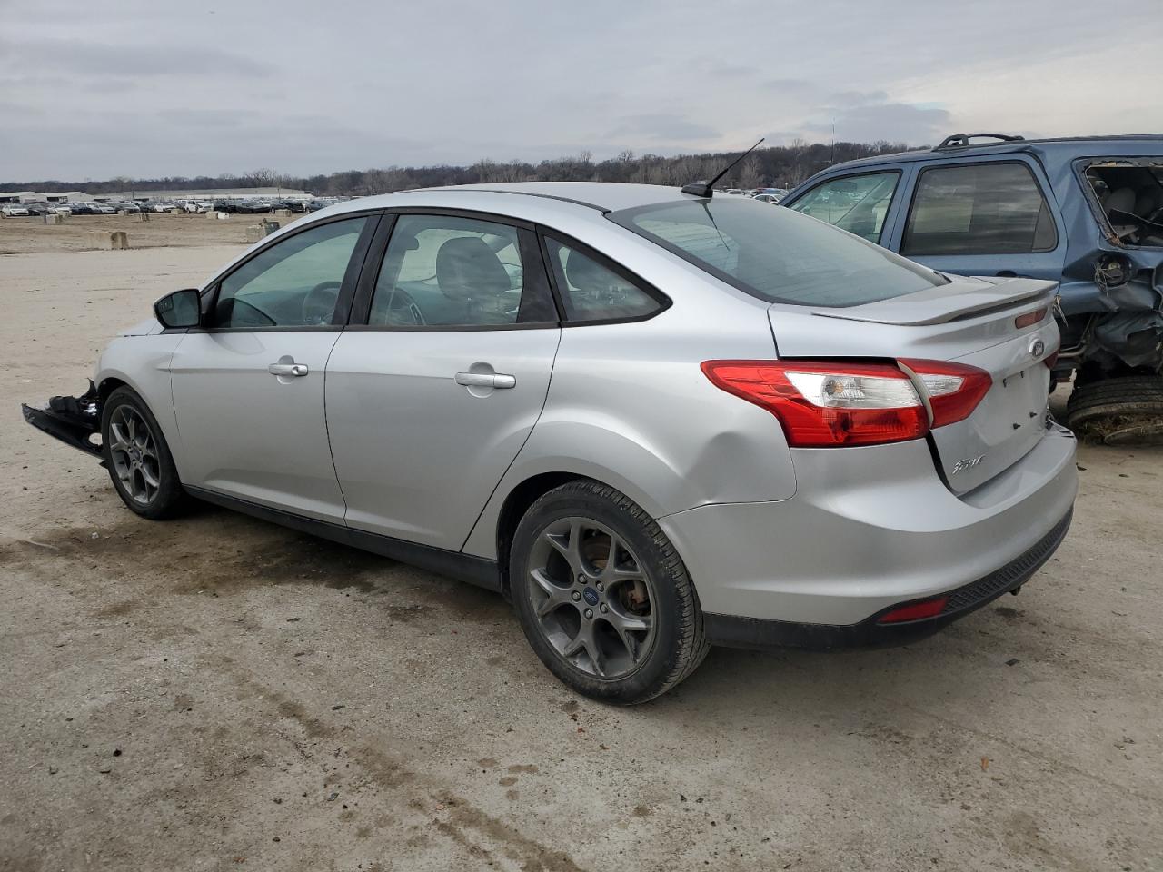 2013 Ford Focus VIN 1FADP3F20DL354201 Copart auction photo, all over damage thumbnail 2