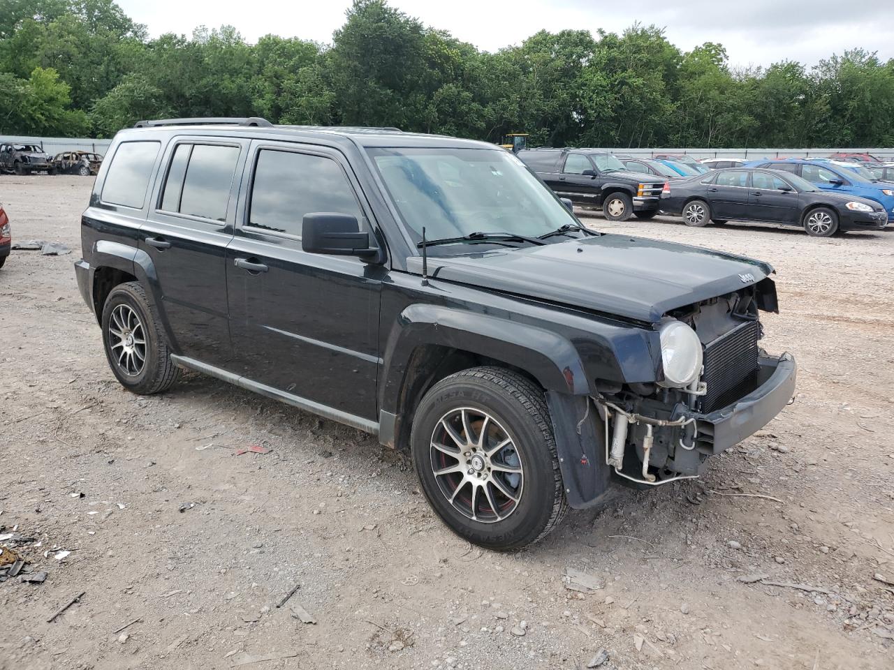 2010 Jeep Liberty (Patriot) VIN 1J4NT2GA9AD504896 Copart auction photo, front end / hail damage thumbnail 4