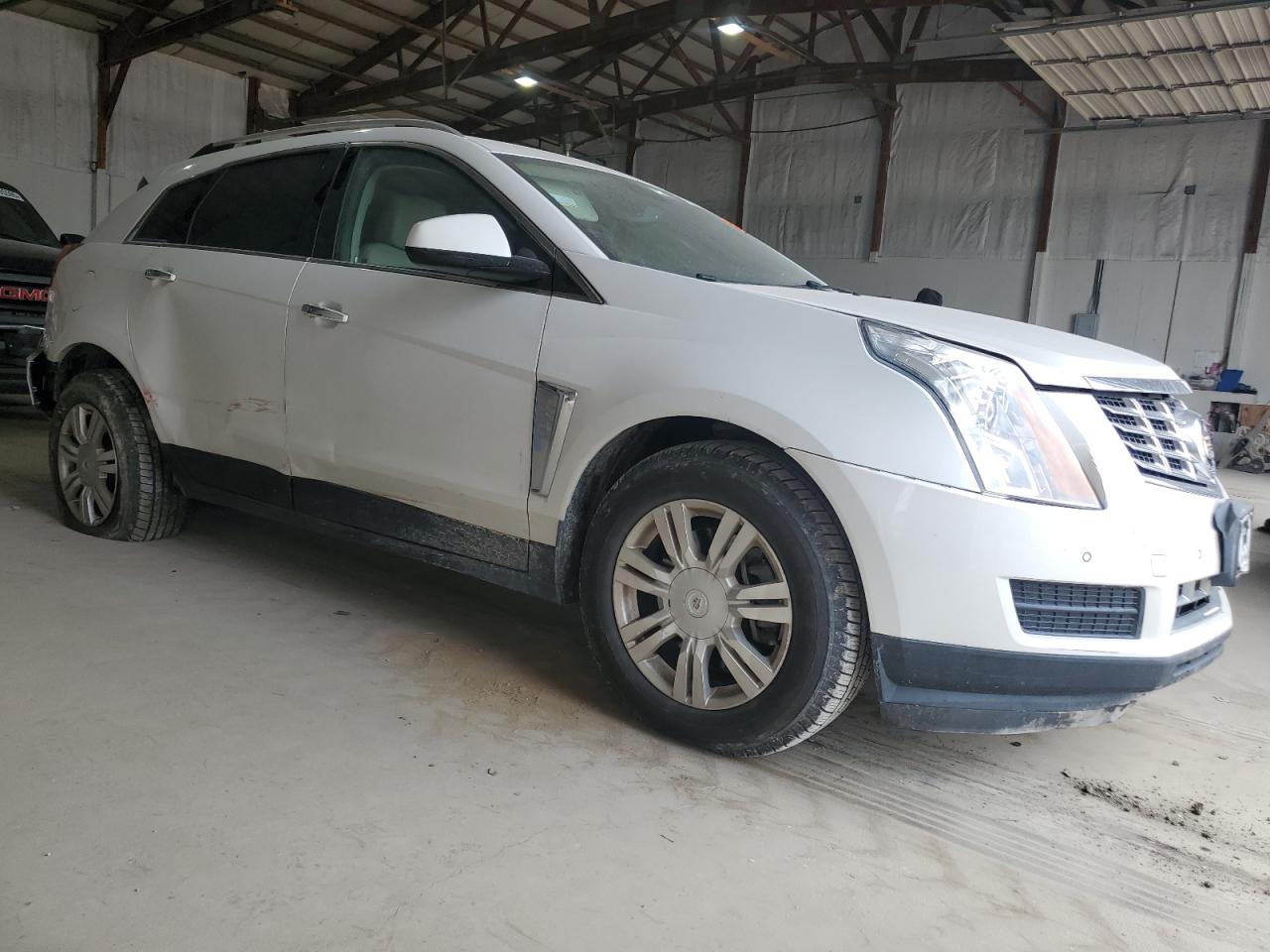 2013 Cadillac SRX VIN 3GYFNCE32DS650604 Copart auction photo, side / all over damage thumbnail 4