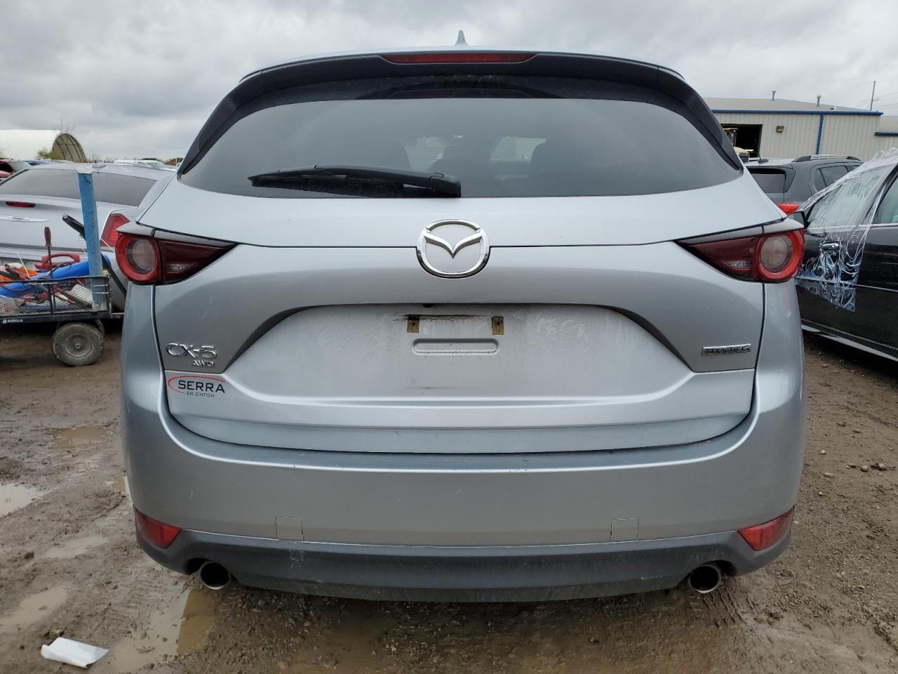 2021 Mazda CX-5 VIN JM3KFBCM7M1474827 Copart auction photo, front end / side damage thumbnail 6
