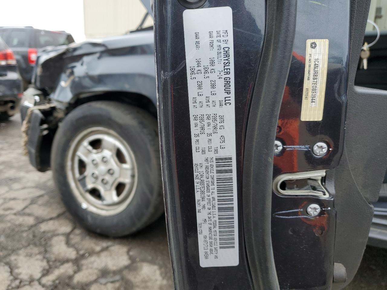 2014 Jeep Liberty (Patriot) VIN 1C4NJRBB7ED891944 Copart auction photo, side damage thumbnail 12