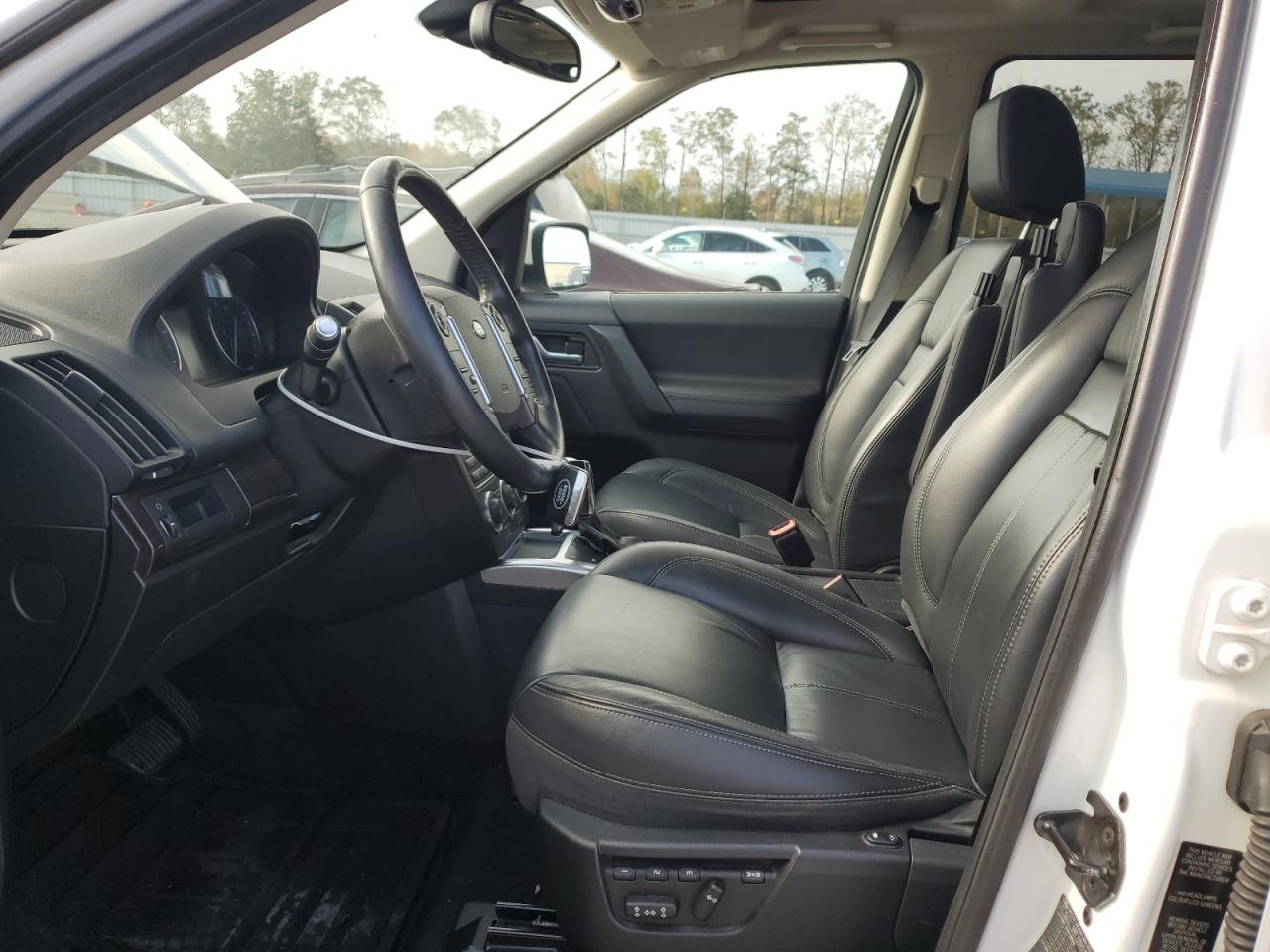 2014 Land Rover LR2 VIN SALFT2BG8EH410408 Copart auction photo, front end / side damage thumbnail 7