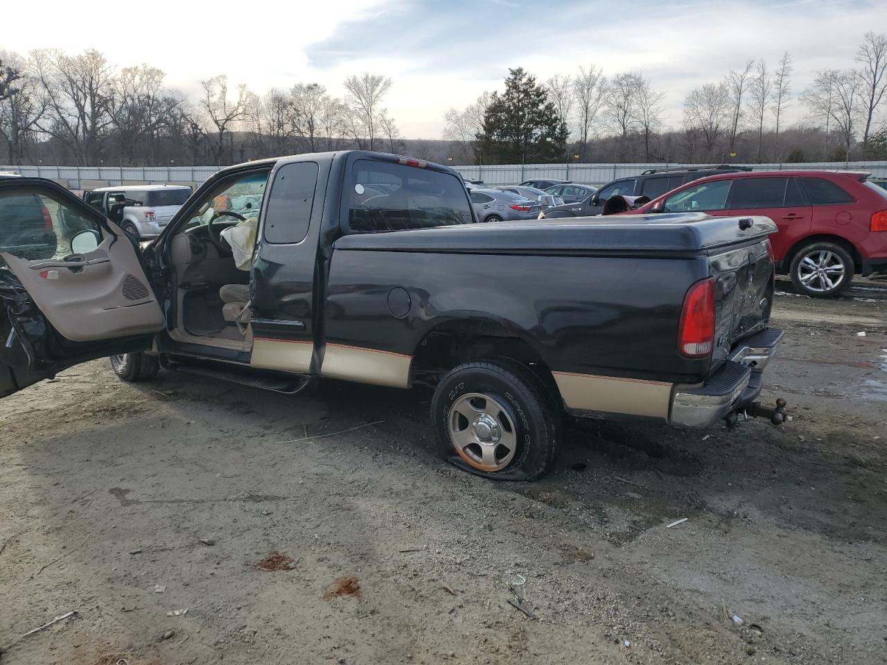 2000 Ford F-150 VIN 1FTRX17L3YNB73860 Copart auction photo, front end / side damage thumbnail 2
