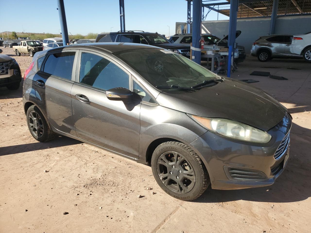2015 Ford Fiesta VIN 3FADP4EJ9FM190771 Copart auction photo, front end damage thumbnail 4