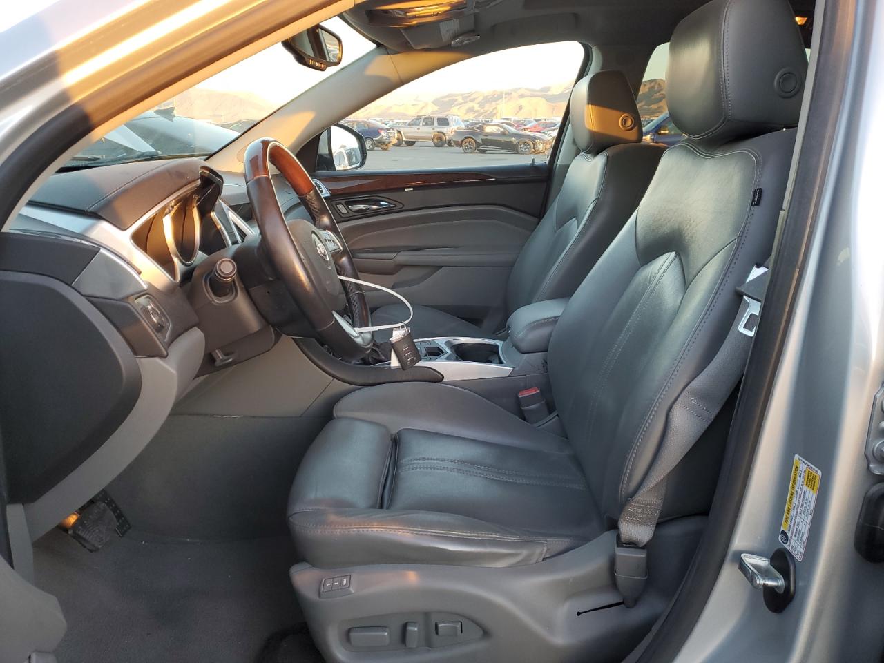 2012 Cadillac SRX VIN 3GYFNCE34CS516143 Copart auction photo, front end damage thumbnail 7