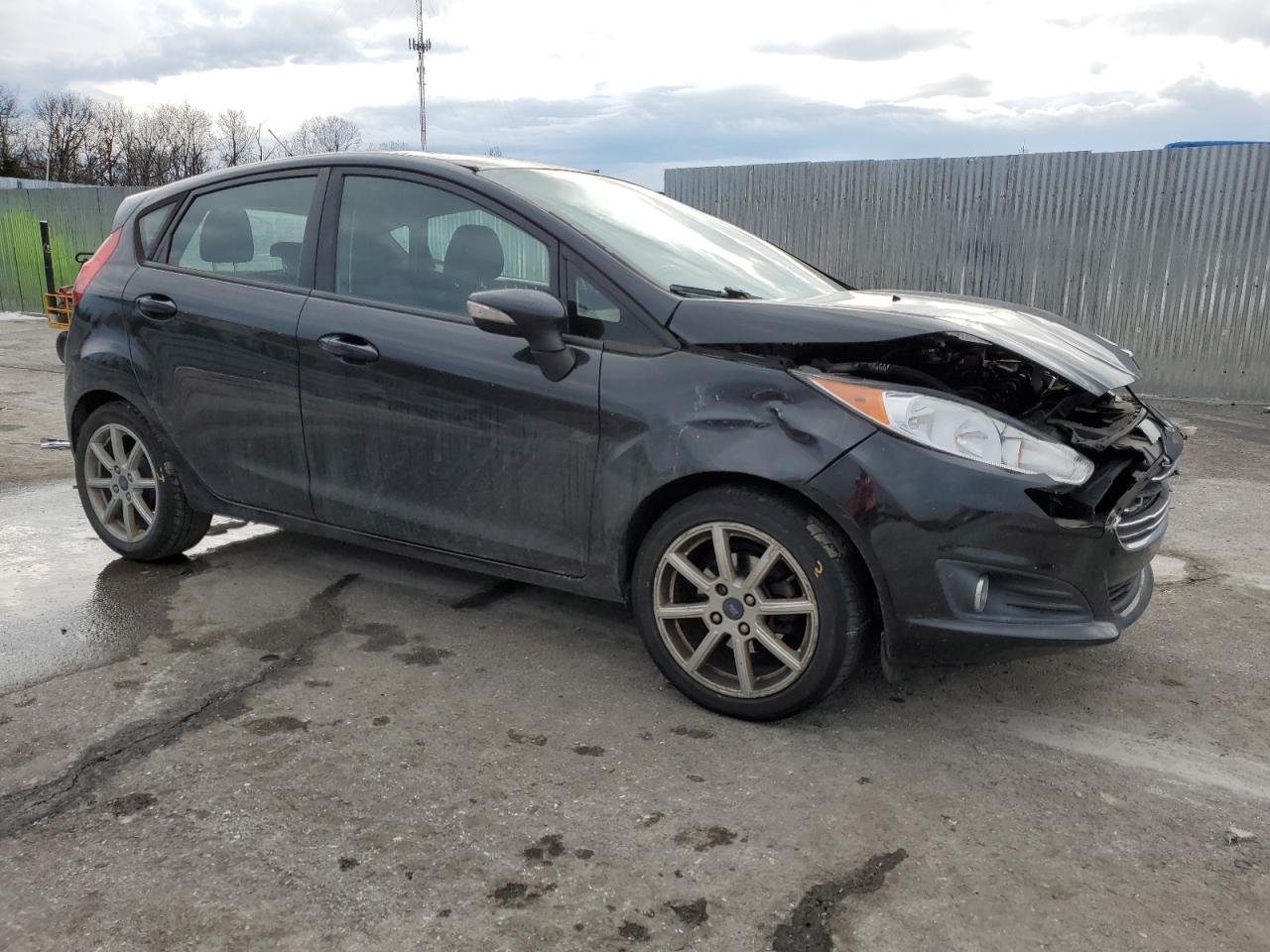 2014 Ford Fiesta VIN 3FADP4EJ0EM228533 Copart auction photo, front end / hail damage thumbnail 4