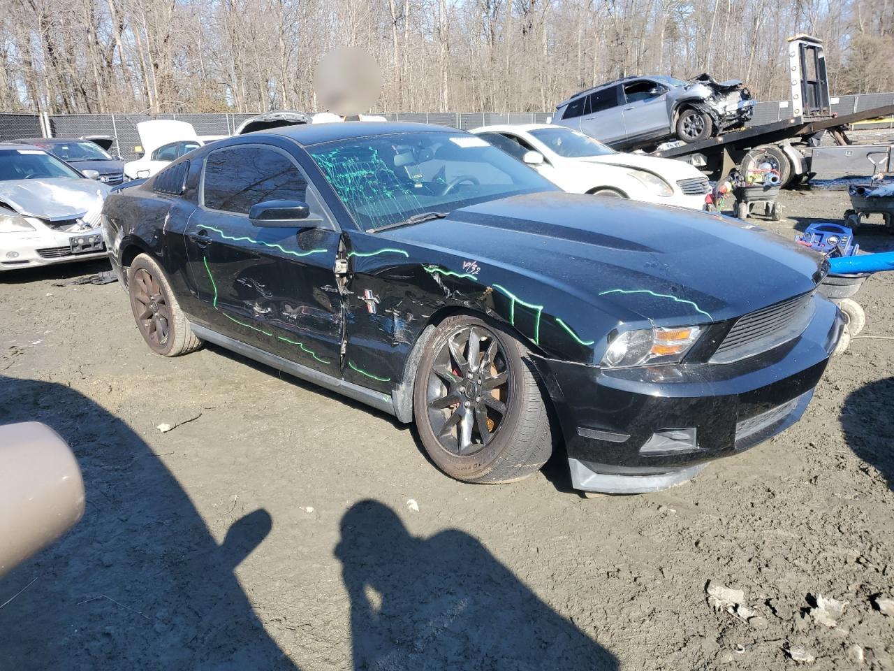 2011 Ford Mustang VIN 1ZVBP8AM8B5157024 Copart auction photo, side / front end damage thumbnail 4