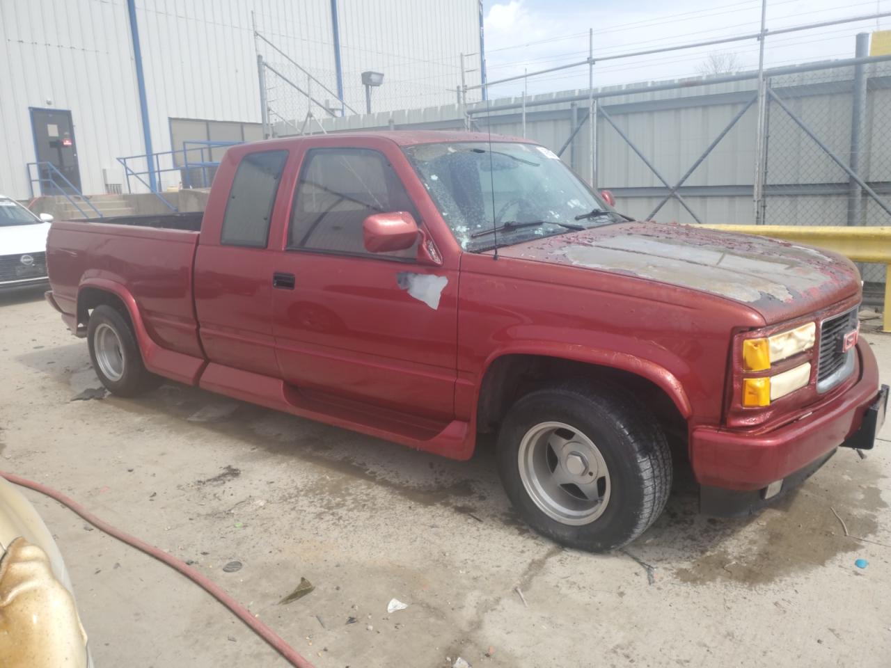 1994 GMC Sierra VIN 2GTEC19K1R1572509 Copart auction photo, burn damage thumbnail 4