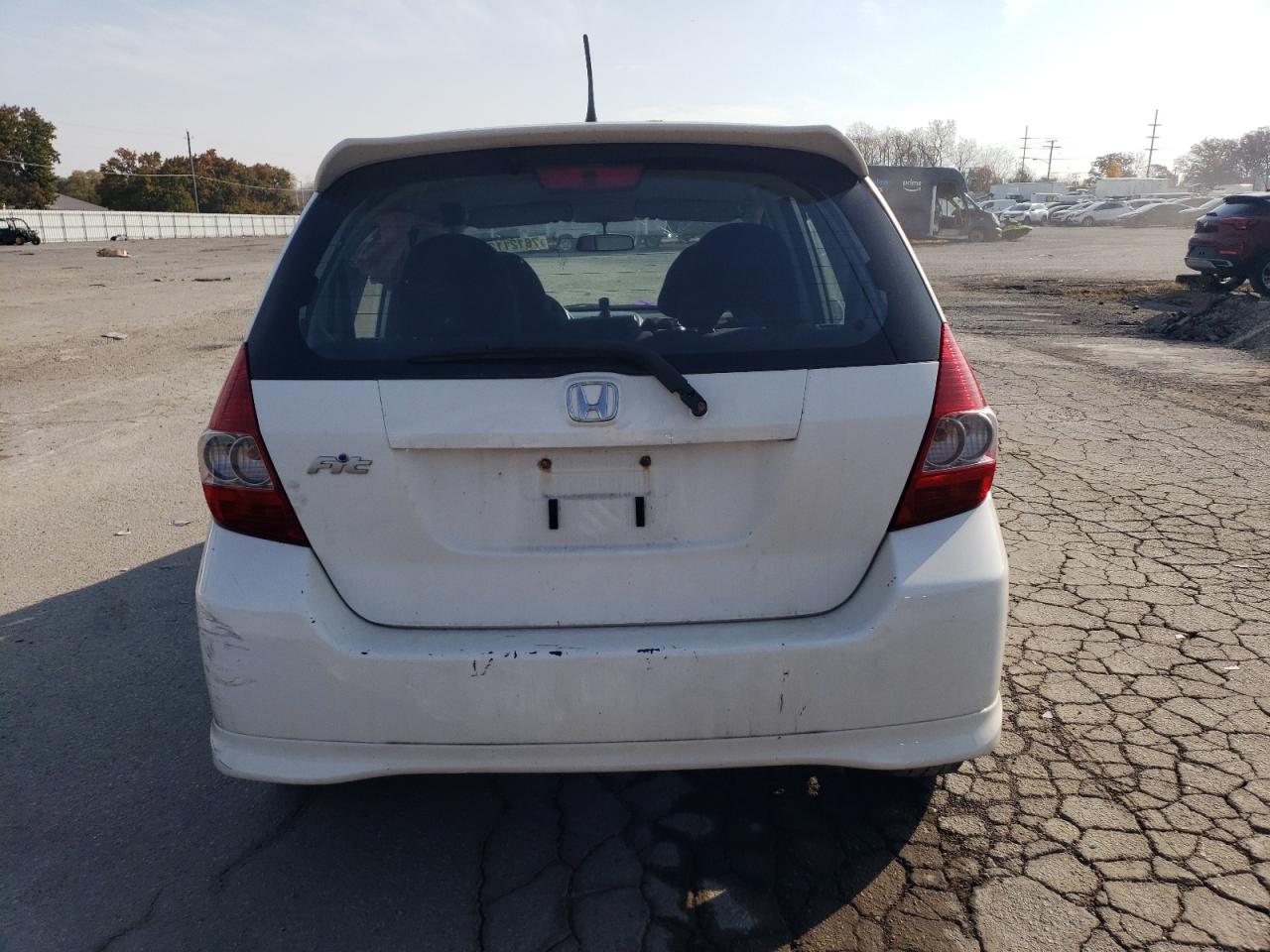 2007 Honda Fit VIN JHMGD38657S028144 Copart auction photo, all over damage thumbnail 6