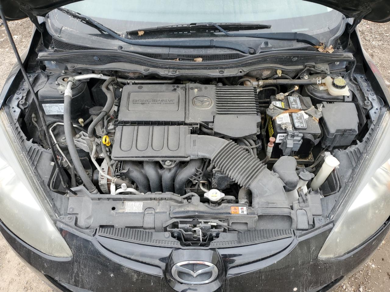 2012 Mazda 2 VIN JM1DE1KY9C0139821 Copart auction photo, side / front end damage thumbnail 11